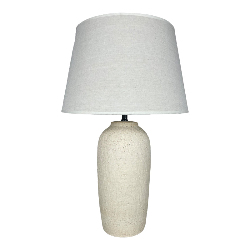 Модерна уметничка столна светилка Table Lamp Waveic со релјефна керамичка основа во беж нијанса и елегантен текстилен абажур што шири топла амбиентална светлина